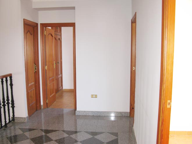 Distribuidor del chalet sito en C/ Vicente Cervantes nº1 de Zafra - PROHERGON