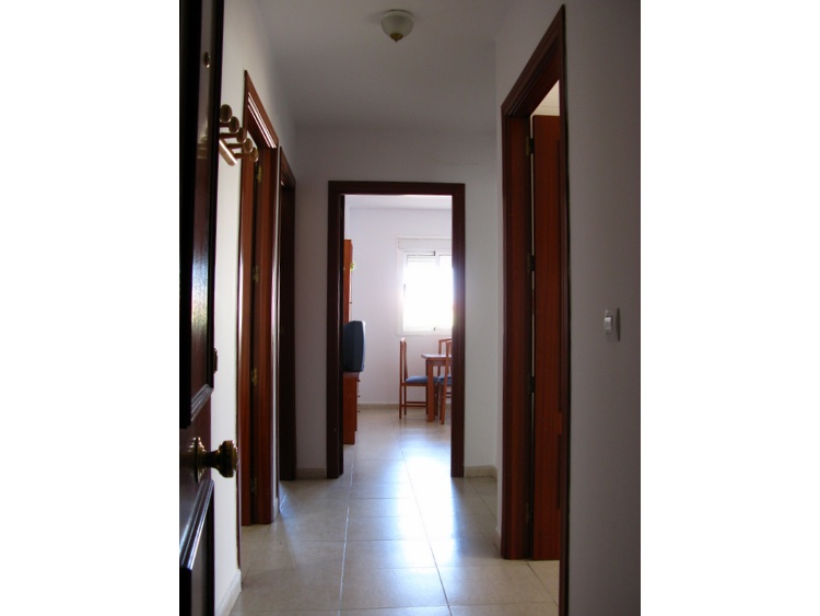 Pasillo del piso 1ºB sito en Ctra. Vieja de la Puebla nº34 - PROHERGON